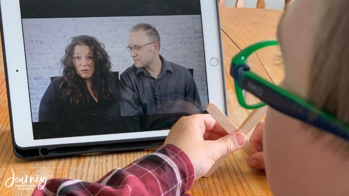 Student watching Journey Homeschool Academy’s World of Birds Christian homeschool science video lesson on a tablet.